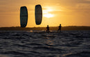 Rider riding the Duotone Evo D/LAB 2027 in a tropical lagoon at sunset
