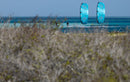 Rider riding the Duotone Evo D/LAB 2027 on open aquamarine sea