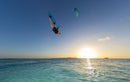 Edgar Ulrich doing an inverted trick with the Duotone Evo D/LAB 2027 over a turquoise lagoon