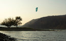 Rider with the Duotone Rebel D/LAB 2026 kite in a river canyon at sunset