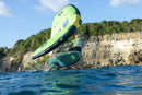 Rider girando con wing y la Duotone Skybrid SLS 2027 junto a la costa de Guadalupe