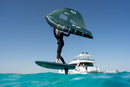 Rider con wing volando en foil con la Duotone Skybrid SLS 2027 junto a un yate