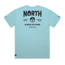Back of the North Origin Tee 2027 T-shirt with NORTH logo and We Never Stop Seeking slogan in navy blue