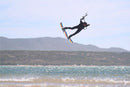 Rider doing an unhooked freestyle trick in the air with the North Pulse 2025