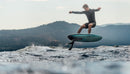 Rider foiling on a lake with Foil Drive electric assist and the North Sonar UHM-FD mast